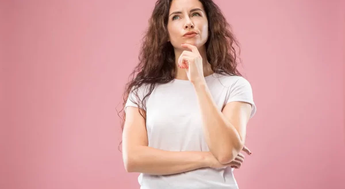 depositphotos_216211138-stock-photo-young-serious-thoughtful-business-woman